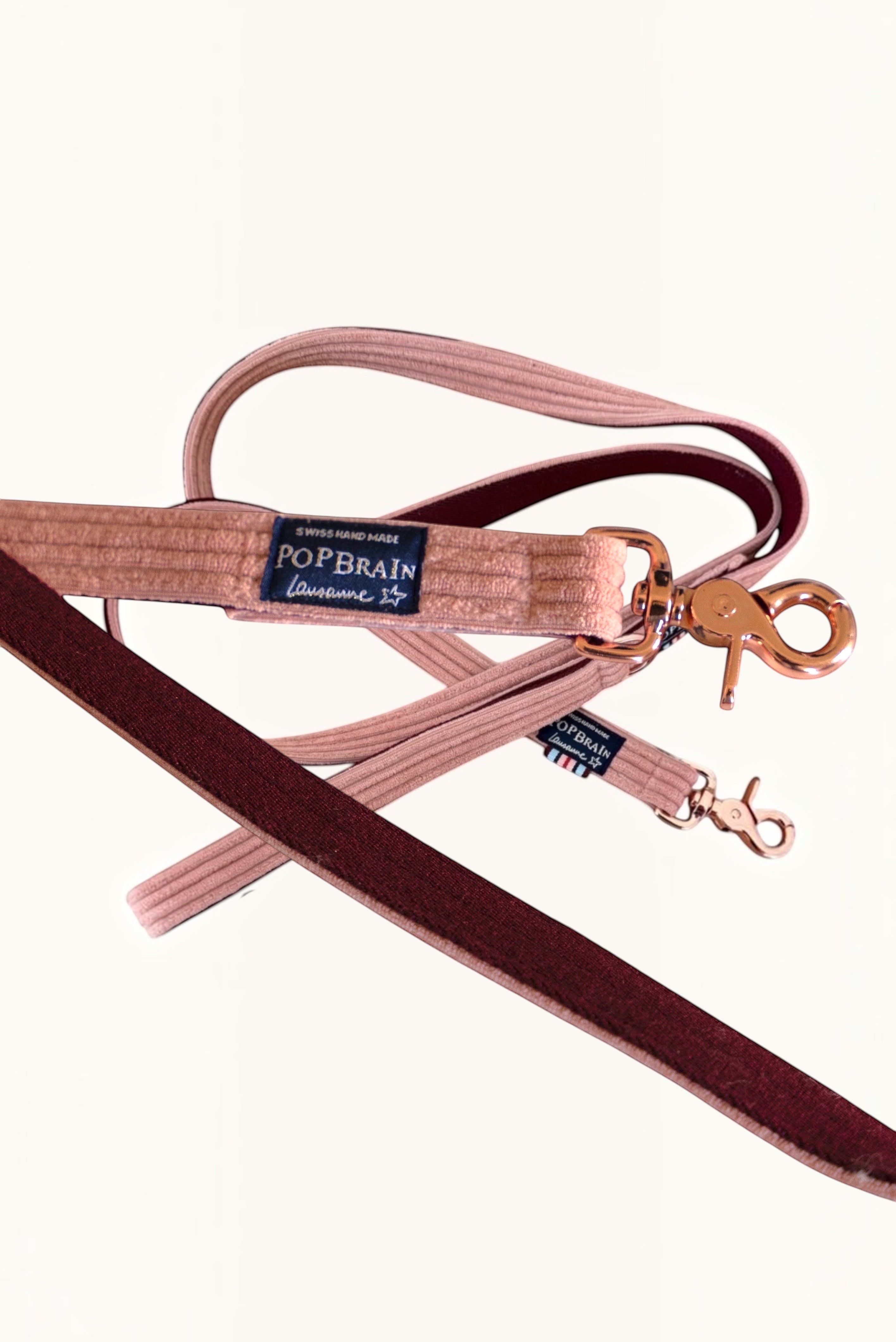 Popbrain Candy dog leash in powder pink corduroy with rose gold hardware and a burgundy lining.