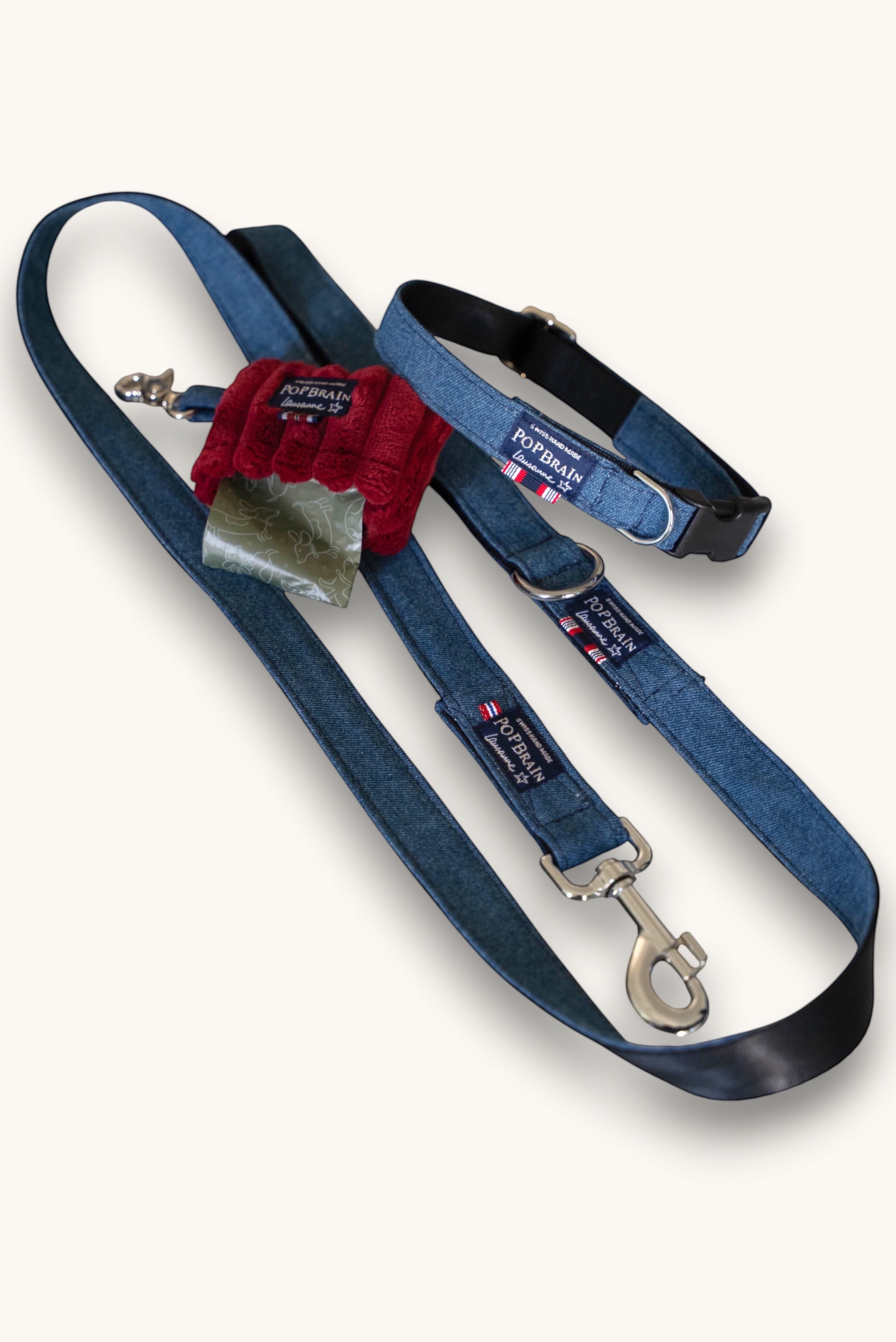 Popbrain indigo denim dog leash and collar set with silver hardware and a red waste bag dispenser