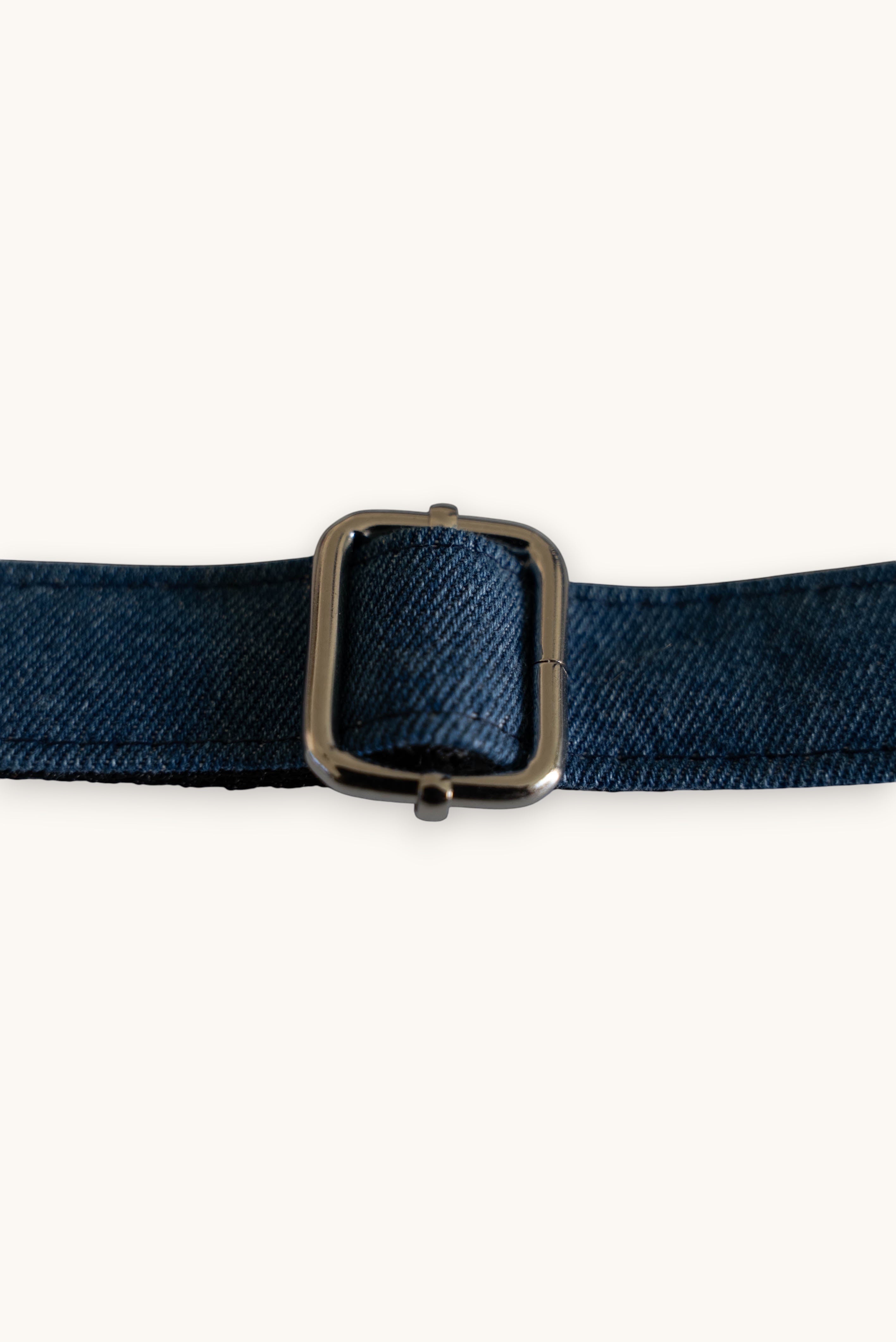 Popbrain indigo denim dog collar featuring a shiny silver metal buckle and durable fabric construction