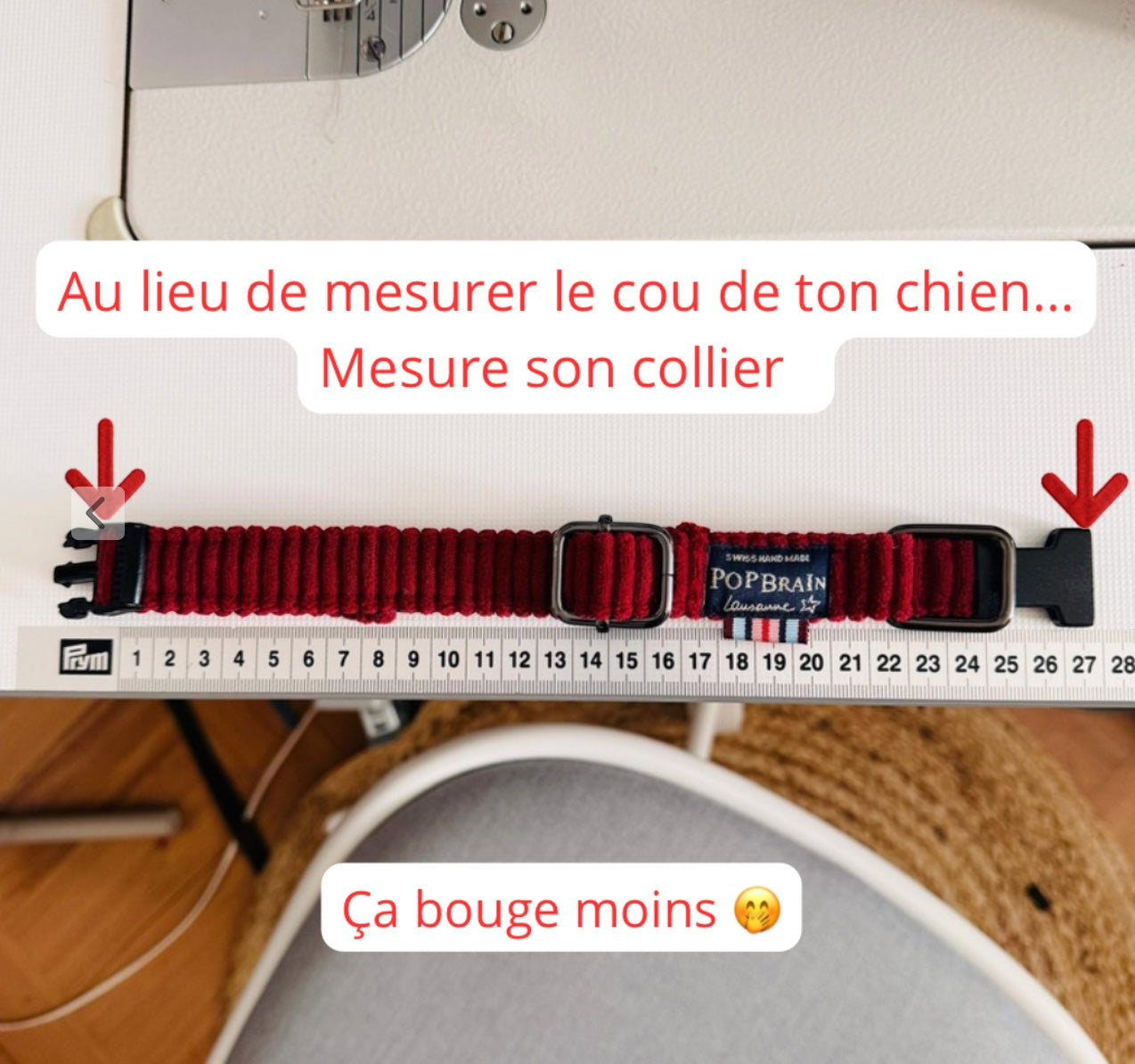 Popbrain handmade red fabric dog collar with silver hardware being measured on a ruler for size accuracy