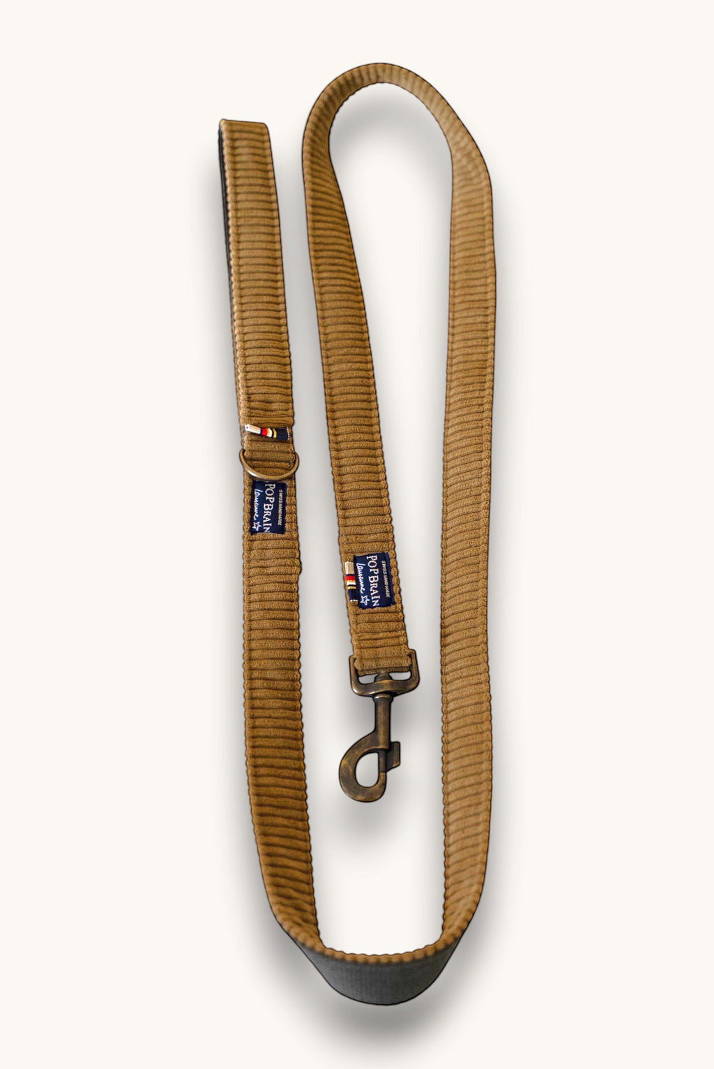 Popbrain Safari dog leash in camel corduroy with an antique bronze clasp, handmade in Switzerland.