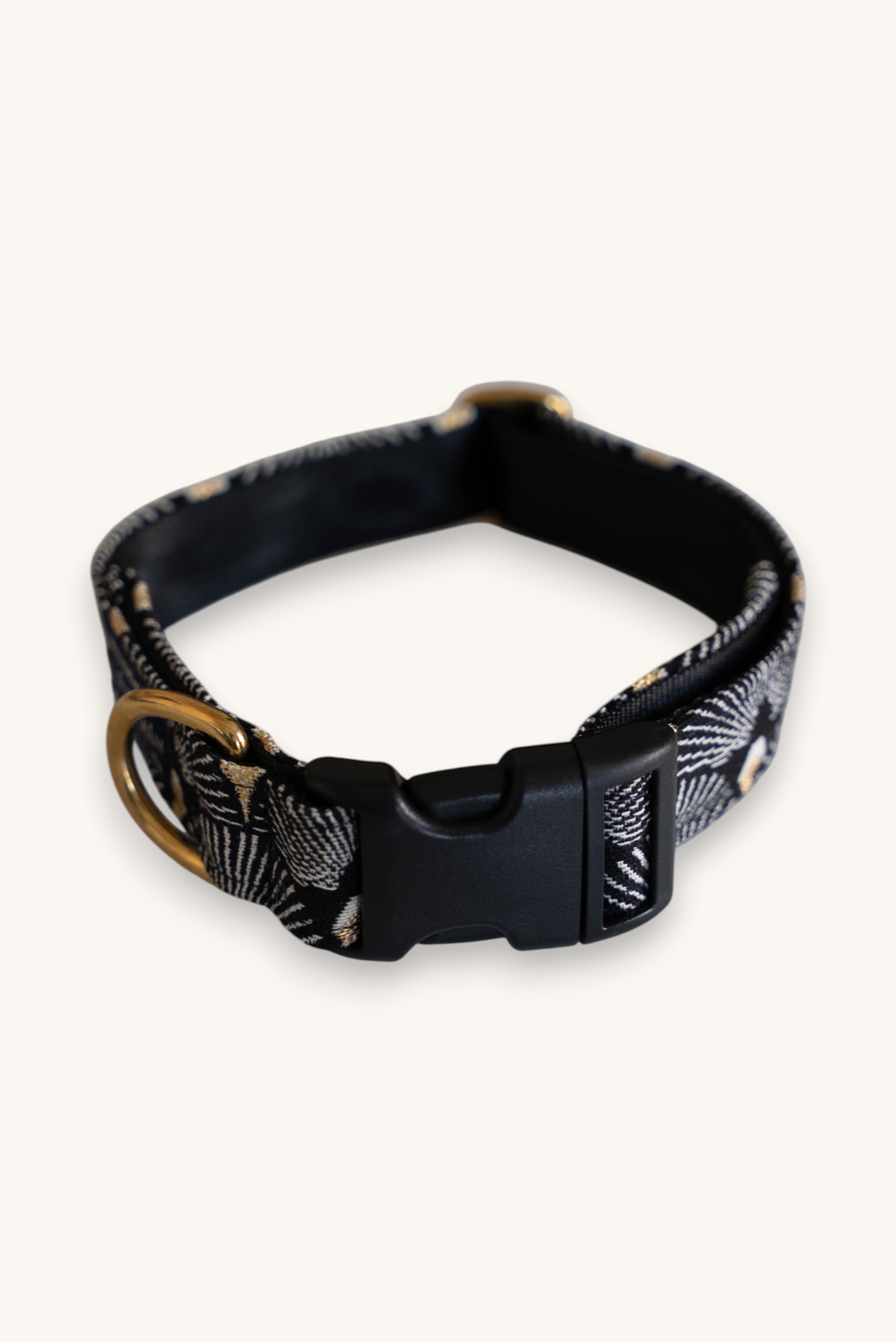 Popbrain Tokyo dog collar in black jacquard fabric with white and gold fan patterns and gold brass hardware.