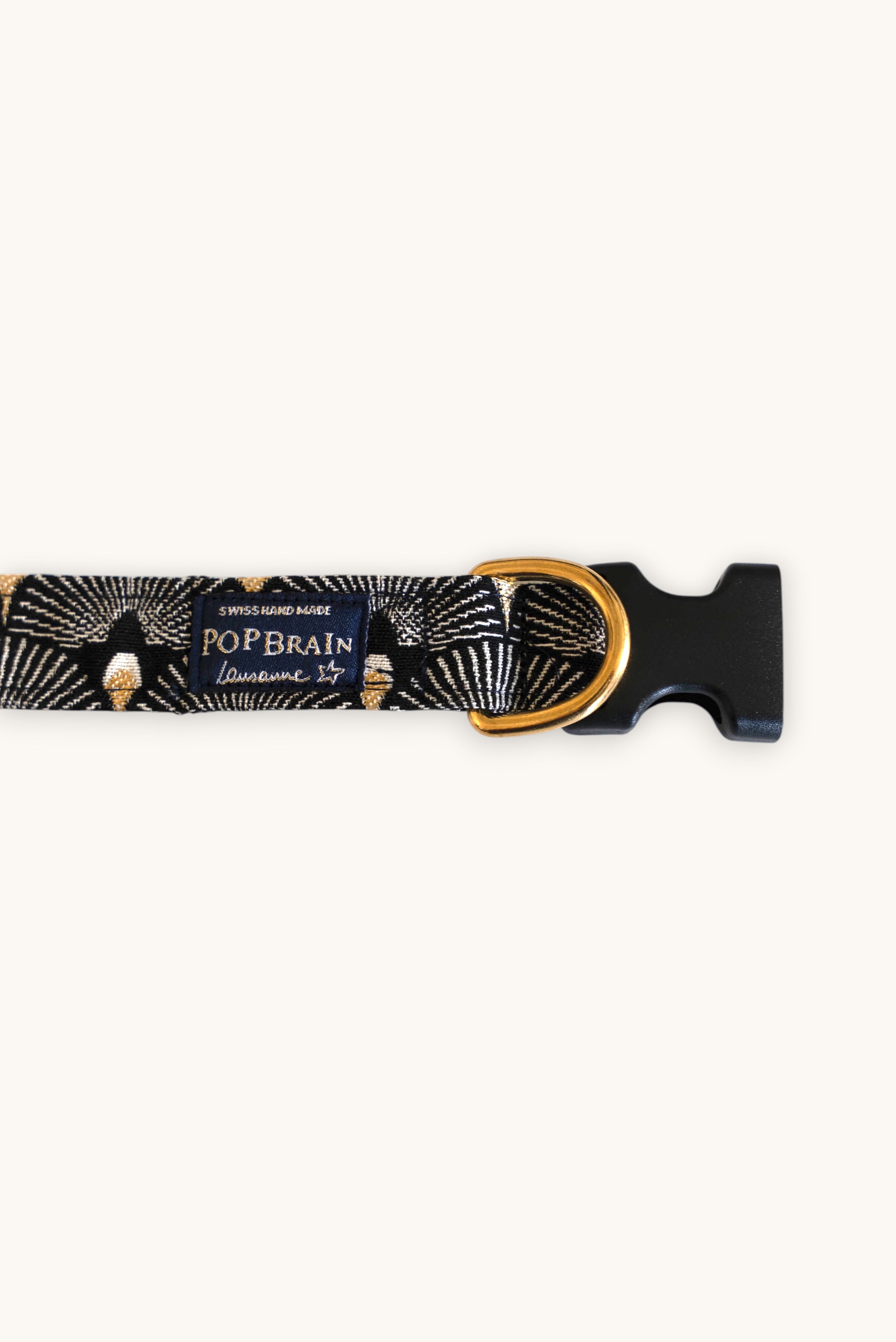 Popbrain Tokyo dog collar in black jacquard fabric with white and gold fan patterns and gold brass hardware.