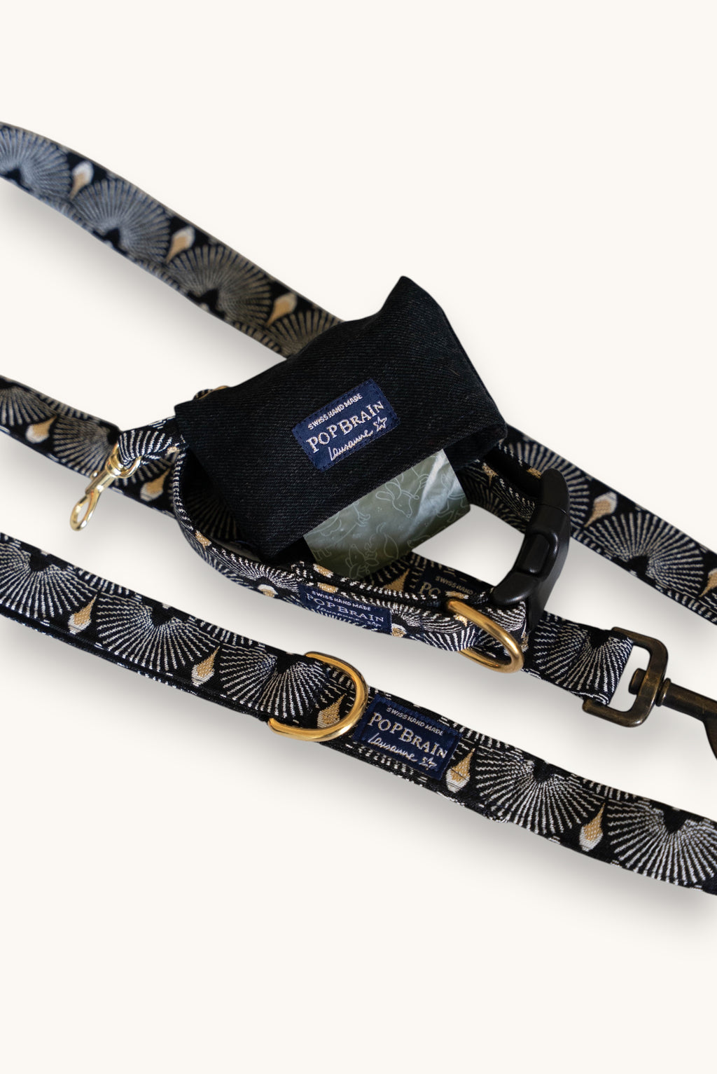 Popbrain Tokyo dog collar and leash set in black jacquard fabric with white and gold fan patterns and brass hardware.