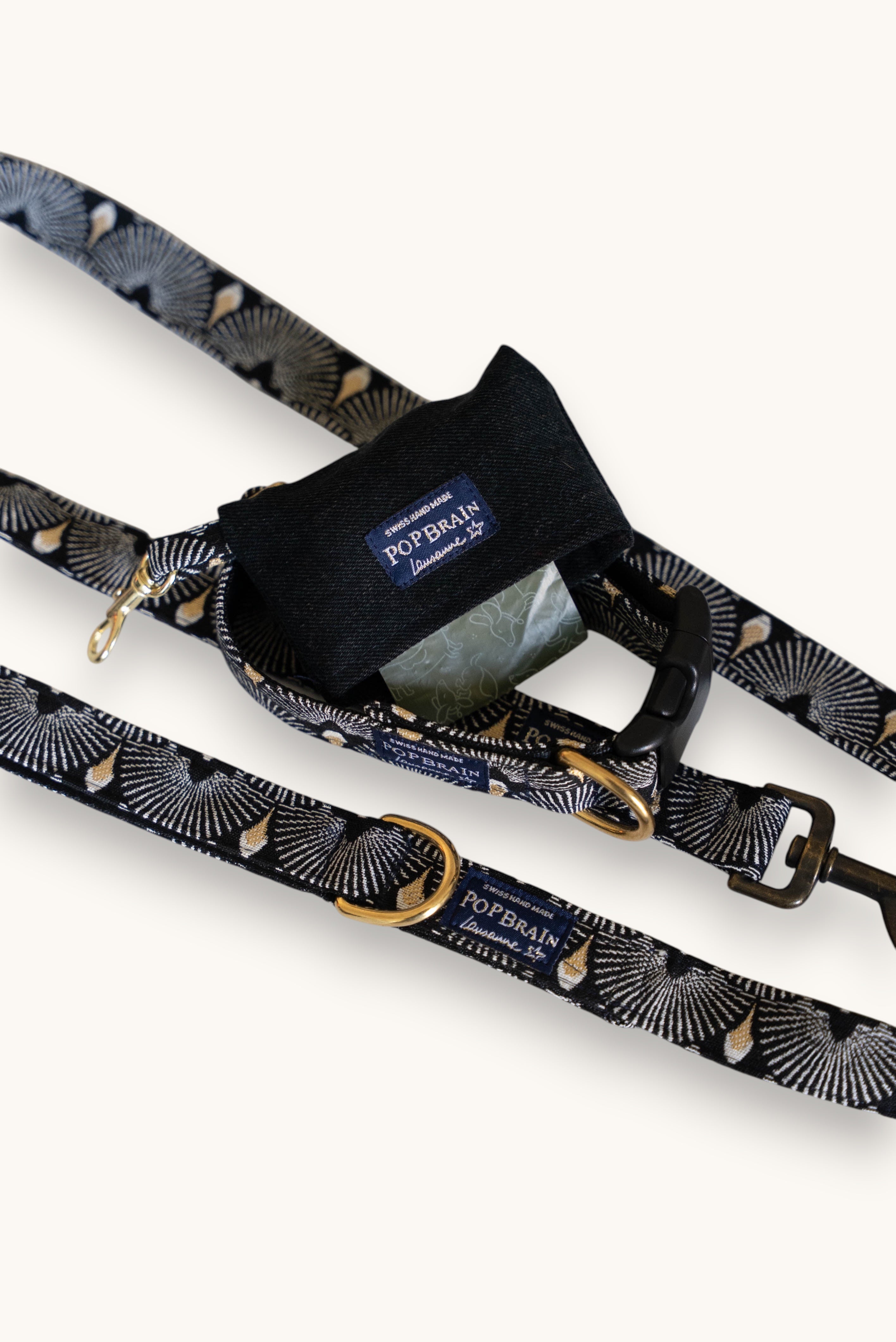 Popbrain Tokyo dog collar and leash set in black jacquard fabric with white and gold fan patterns and brass hardware.
