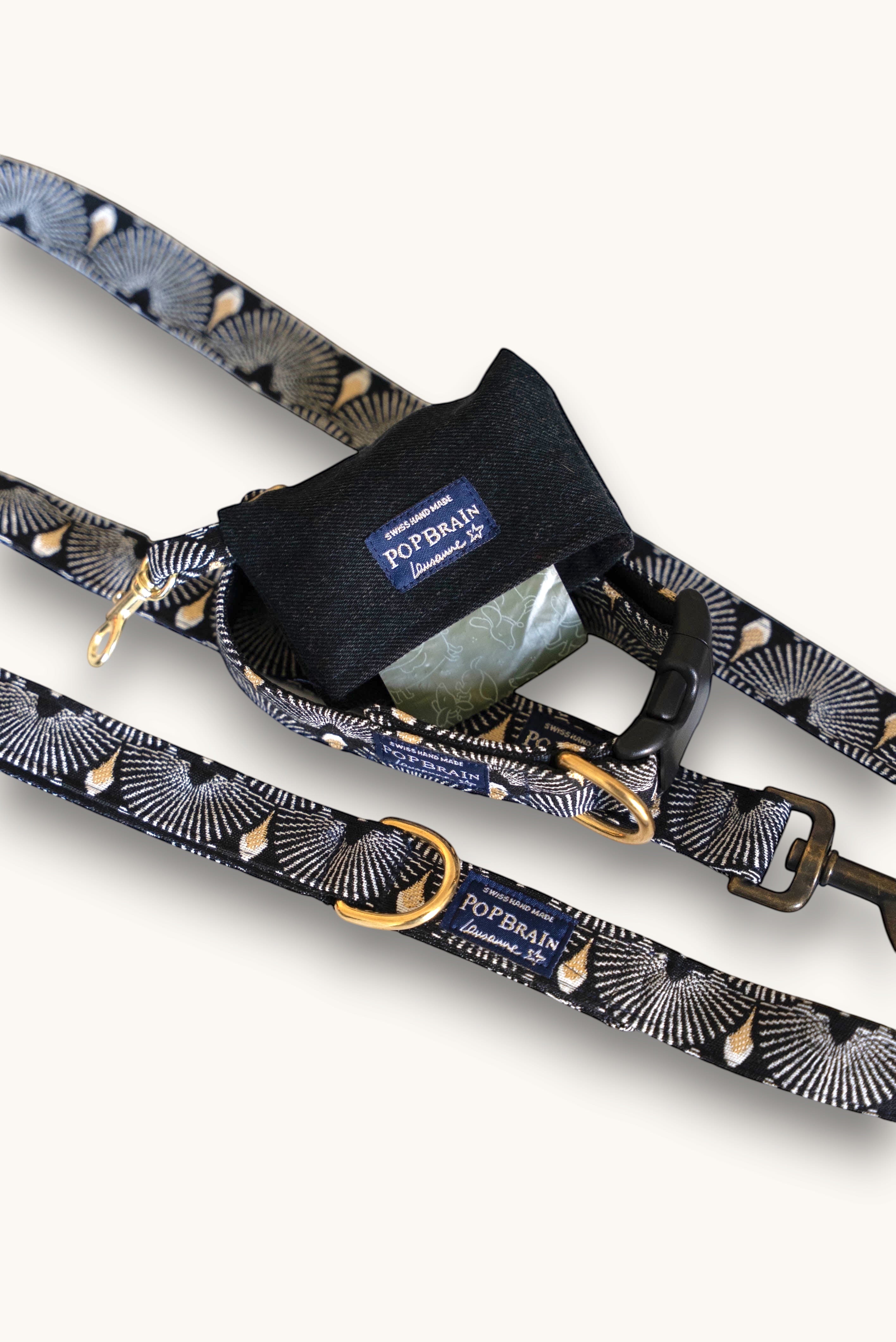 Popbrain Tokyo dog leash and matching waste bag holder in black jacquard fabric with white and gold fan patterns.
