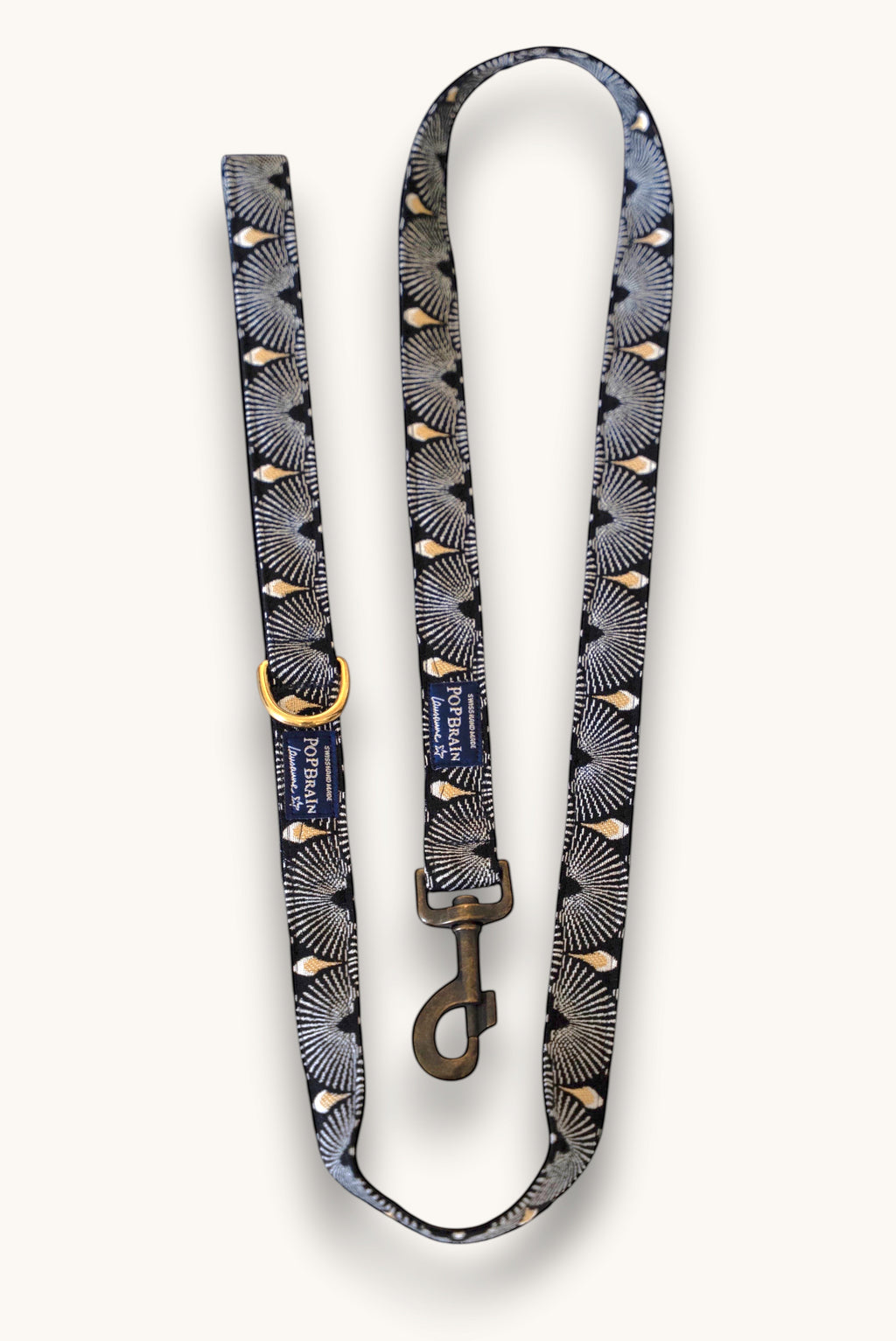 Popbrain Tokyo dog leash in black jacquard fabric with white and gold fan patterns and bronze hardware.